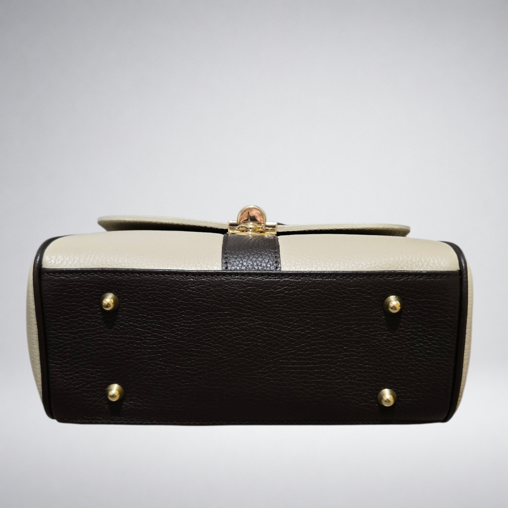Borsa Genny – Borsa a mano in pelle bicolore con chiusura gioiello