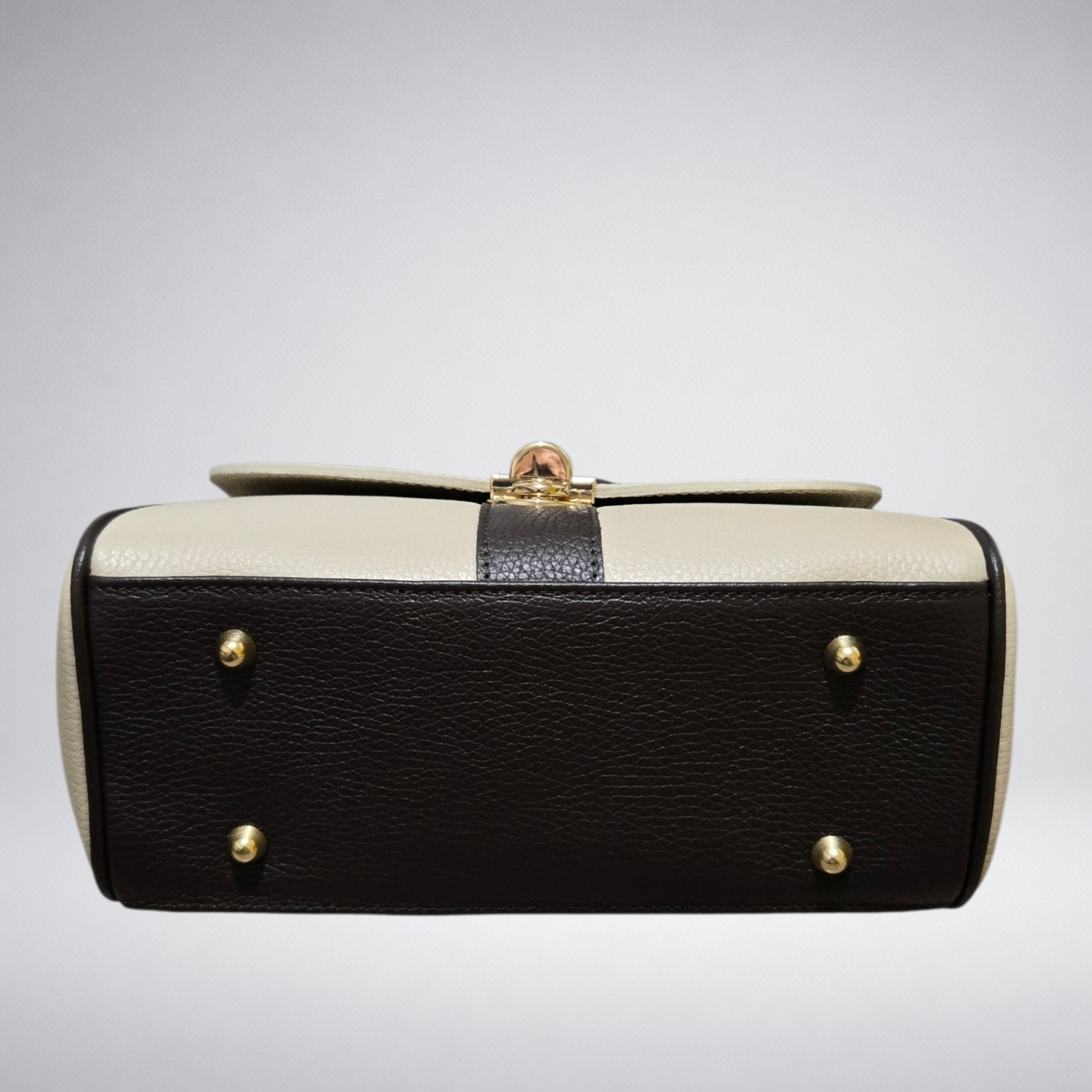 Borsa Genny – Borsa a mano in pelle bicolore con chiusura gioiello